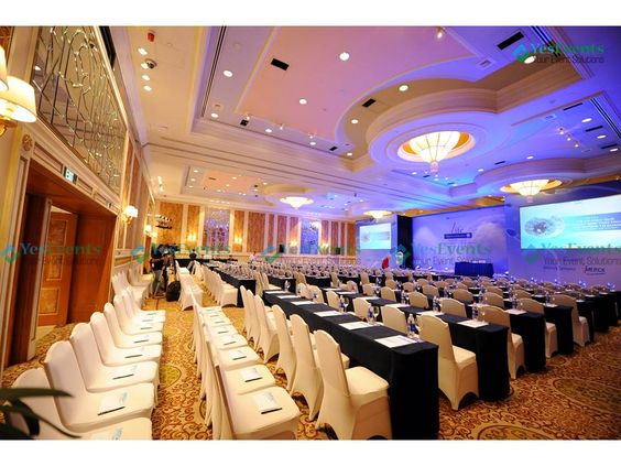a large room with a long table and chairs