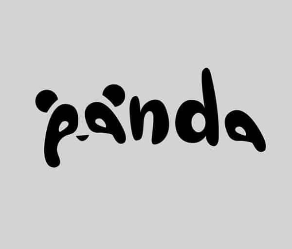 a black and white photo of a panda bear