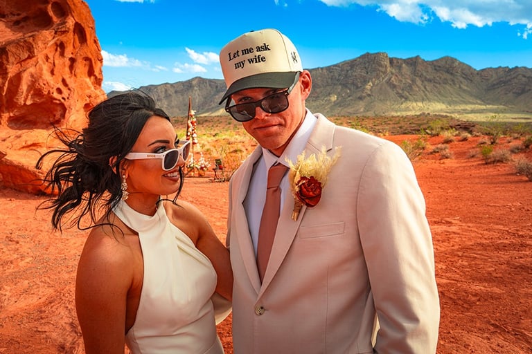 a man and woman in white wedding attire