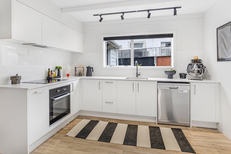 white modern kitchen after renovation