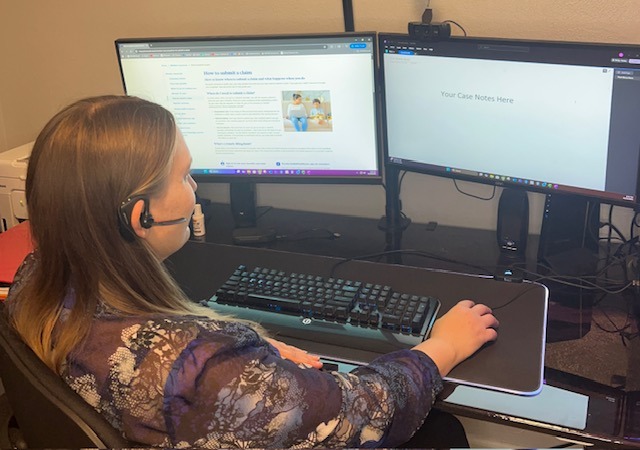 Patient Advocate hard at work on calls, reviewing case notes, and claims information.