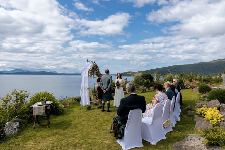 a wedding ceremony on the coast with a view of the water