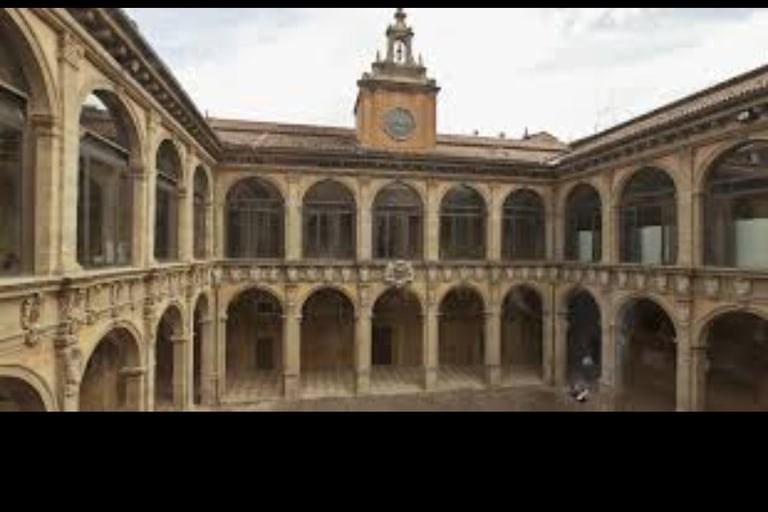 a building with a clock tower in the middle of it