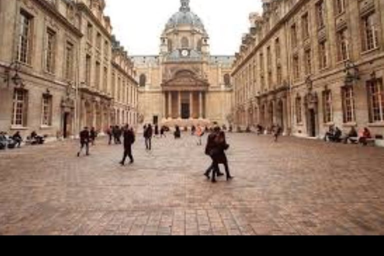 a group of people walking around a courtyard