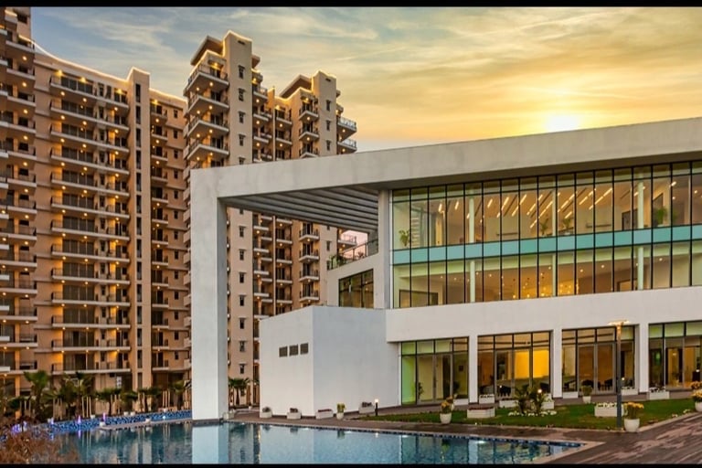 a large building with a pool and a swimming pool