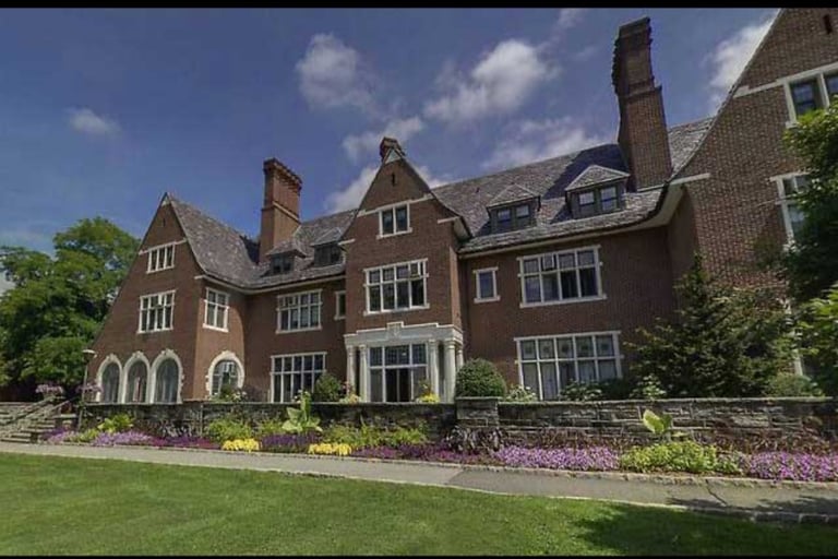 a large house with a large brick building