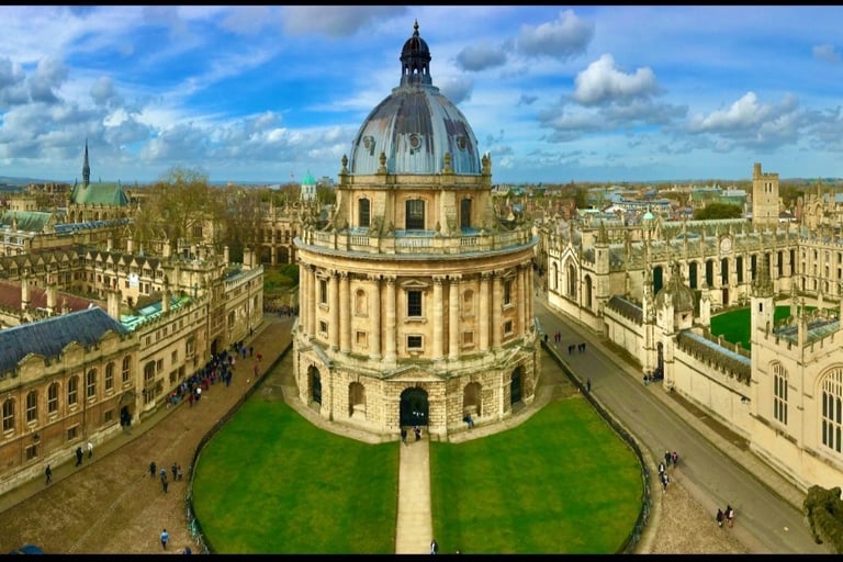 a large building with a dome shaped building in the middle of it