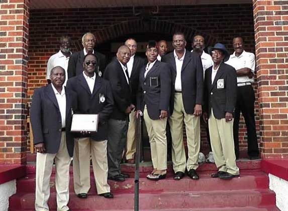 Par Four Golf Club group of black men on the steps