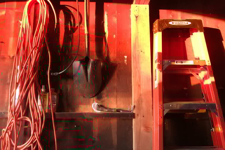 Sunset illuminates a red barn