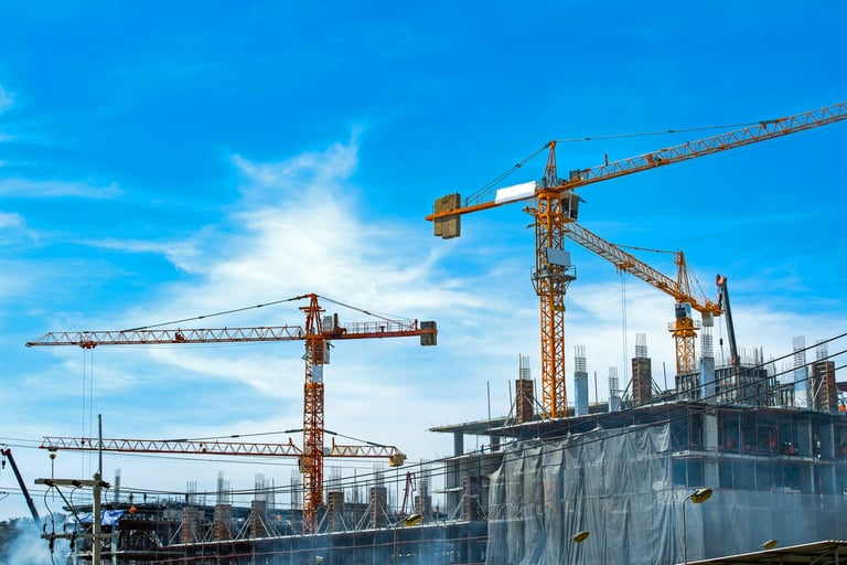 a crane is standing in front of a building