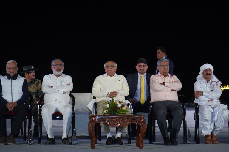 a group of men sitting in chairs with their arms crossed