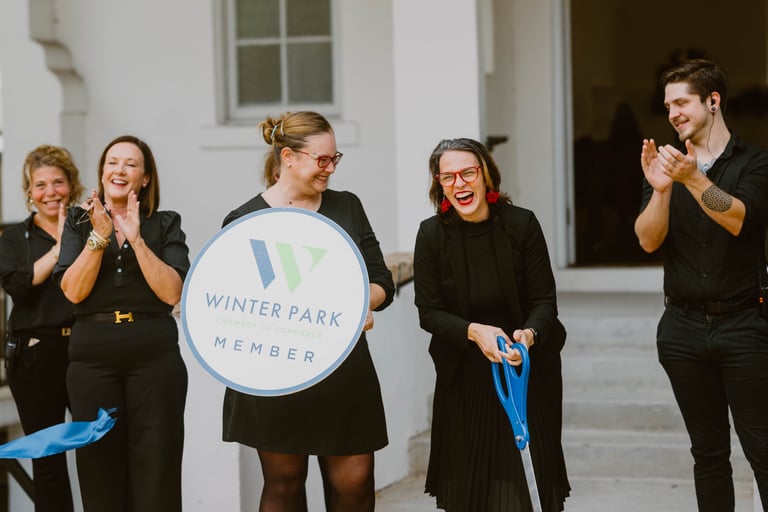 melody morrison allegro events ribbon cutting with Winter Park Chamber at Chapel and Cellar