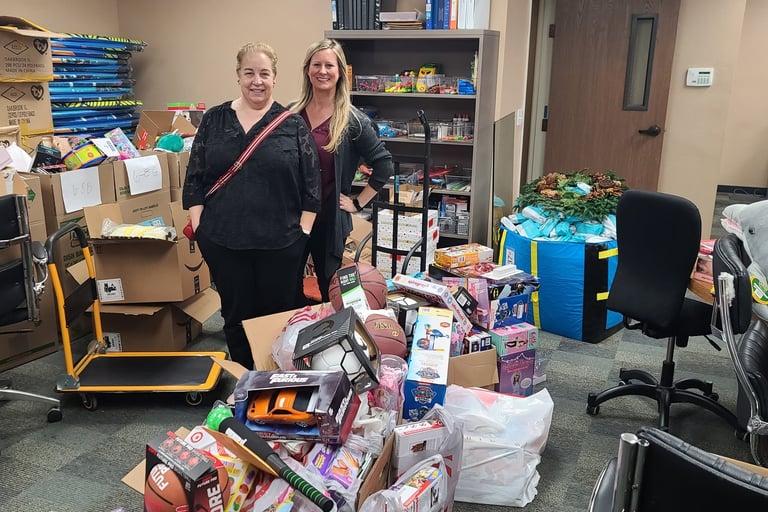 Jiffy Lube employees setting up a toy drive for Christmas