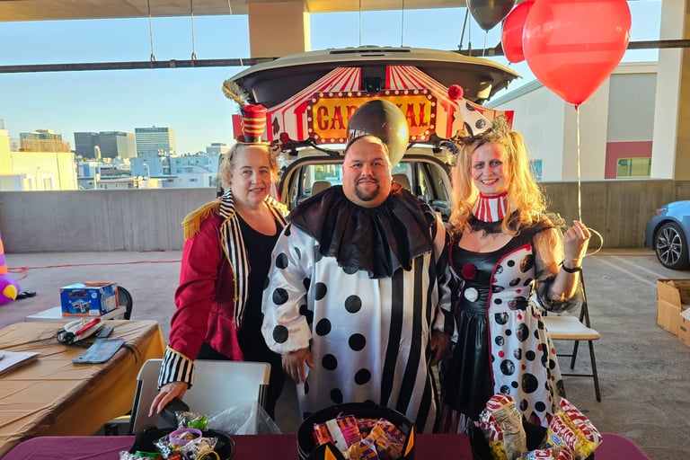 Jiffy Lube employees set up a booth for the Boys and Girls Club for Halloween