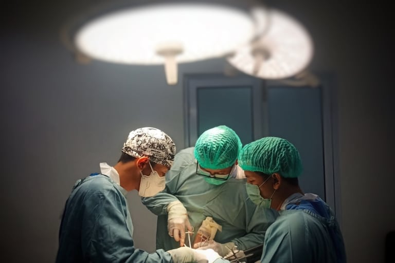 a group of surgeons performing surgery in a hospital