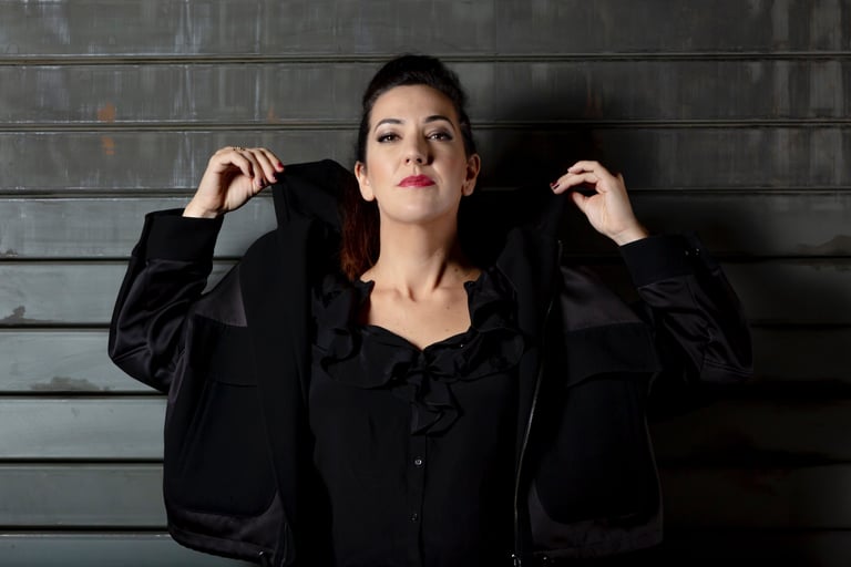 a woman in a black jacket and a black jacket