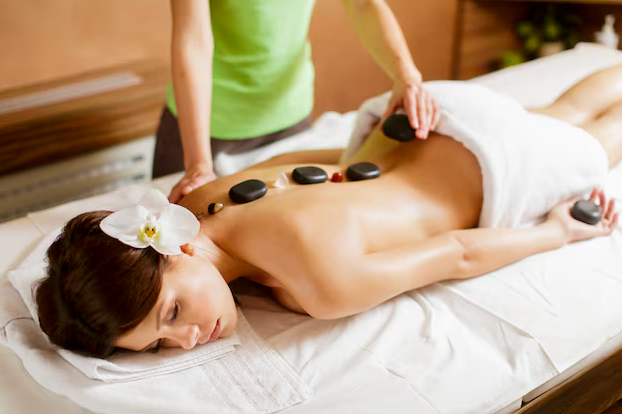Hot Stone Massage helps melt away deep muscle tension, improve circulation, and ease stiffness