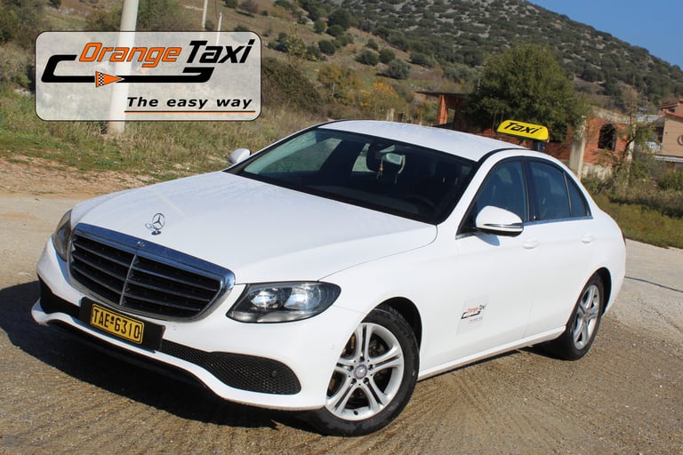 Λευκό ταξί Mercedes στην Καβάλα - Orange Taxi εξυπηρέτηση