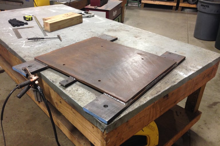 custom 250lb baseplate for wheels to roll a machine around.