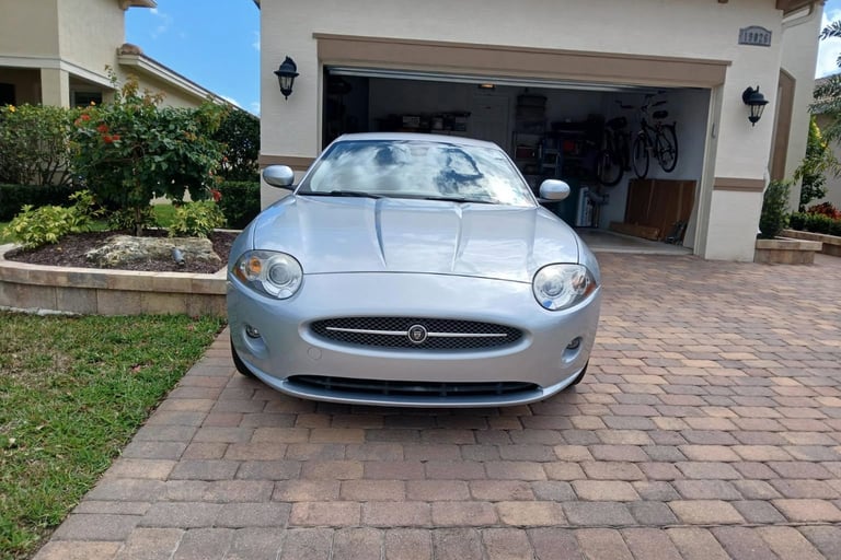 A front view of a silver 2007 Jaguar XK (X150). coupe.