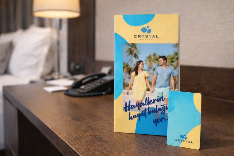 Crystal Hotels oda içi bilgilendirme broşürü ve kart tasarımı uygulaması
