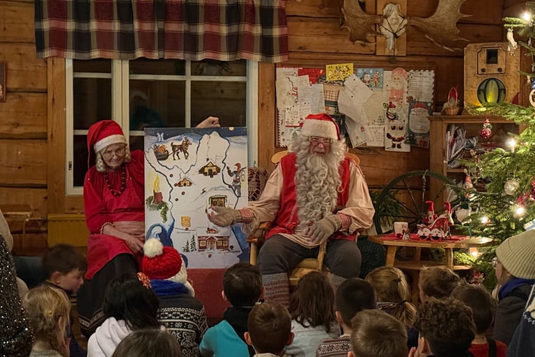 childten with santa in ruka lapland finland