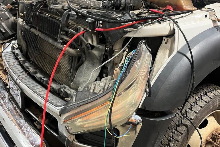 Truck taken apart for a plow installation