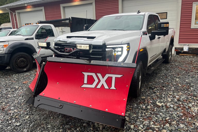 Truck with a boss plow intalled.