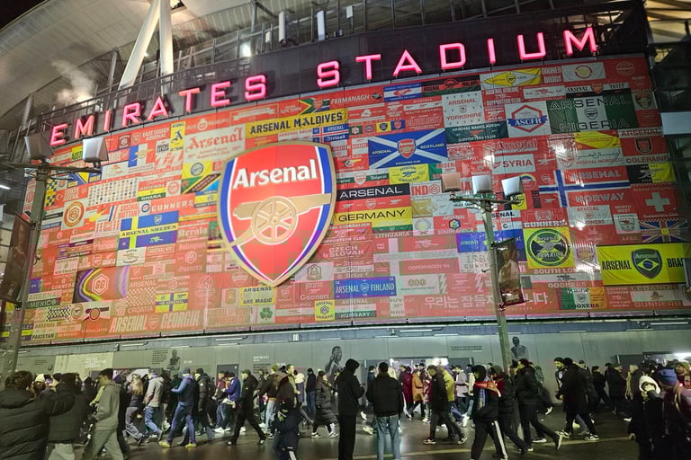 Fans leaving Arsenal's Emirates Stadium.