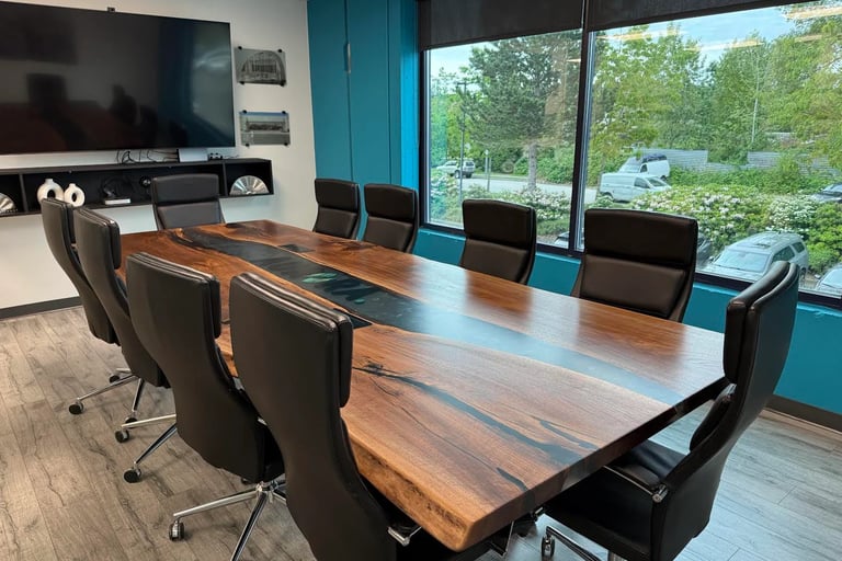 Live edge Black Walnut conference table with black epoxy river and custom steel legs