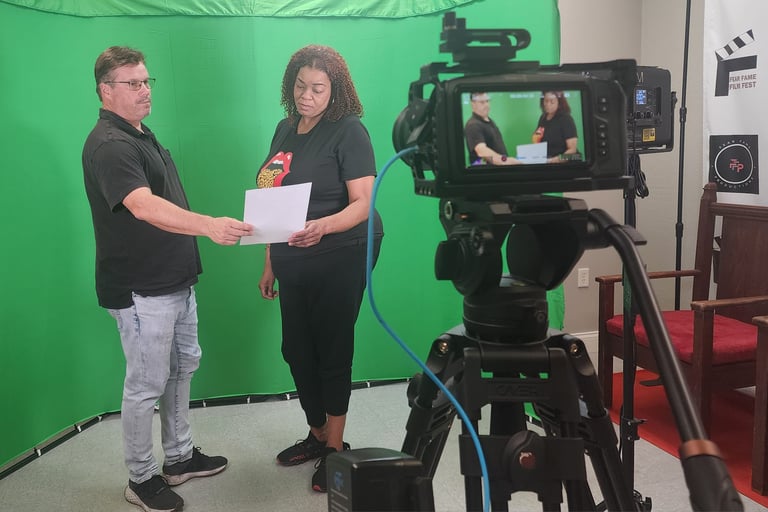 Hands-on filmmaking activity during a Fear Fame Arts Foundation workshop.