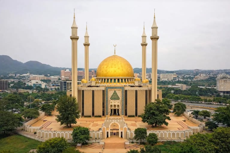National Mosque of Abuja in Nigeria with its golden dome and tall minarets, a major religious center in West Africa.