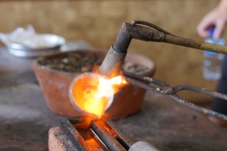 Silver granule is melted during silver class workshop