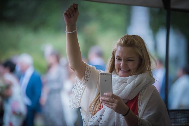 dding guest on telephone after wedding ceremony