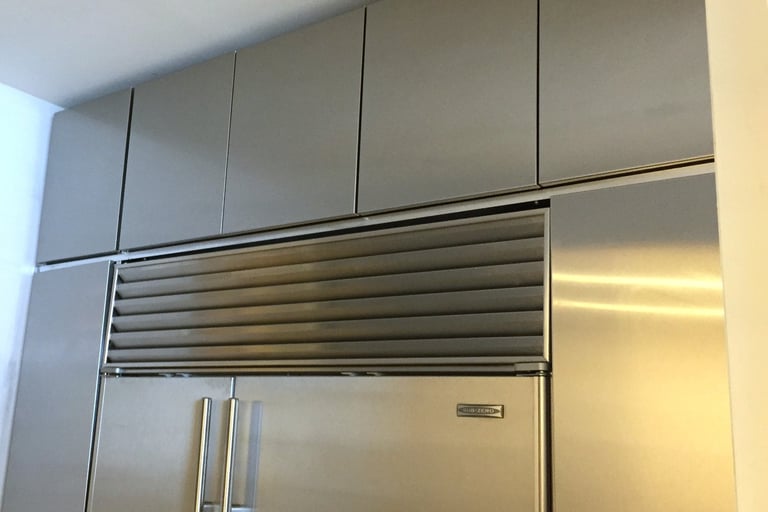 Custom stainless steel cabinets for residential use.
