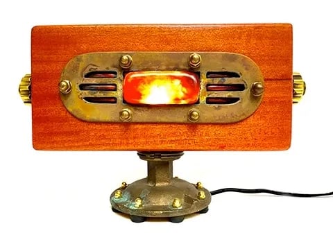 Custom light made from wood and brass objects.