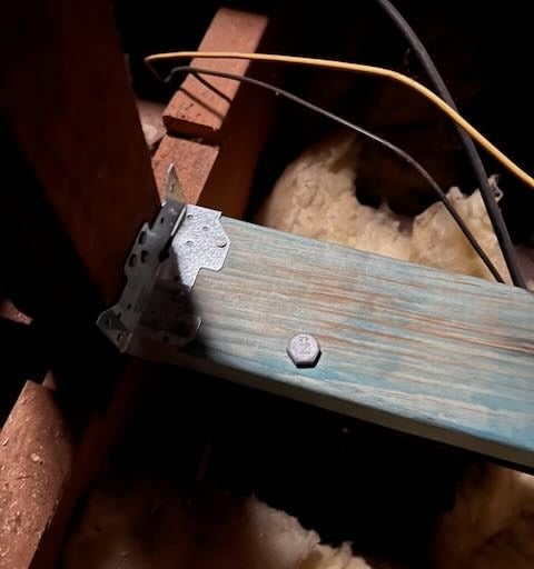 Triple grip and bolt installed to timber 