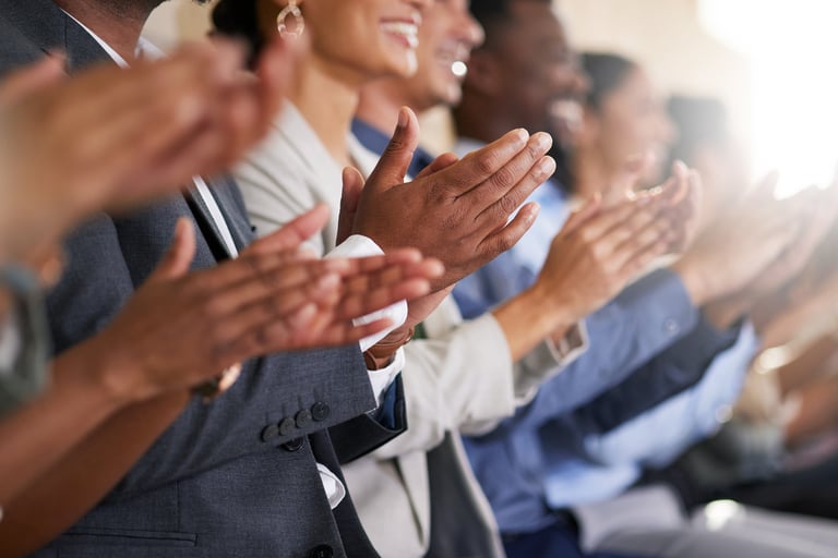 Image of people clapping