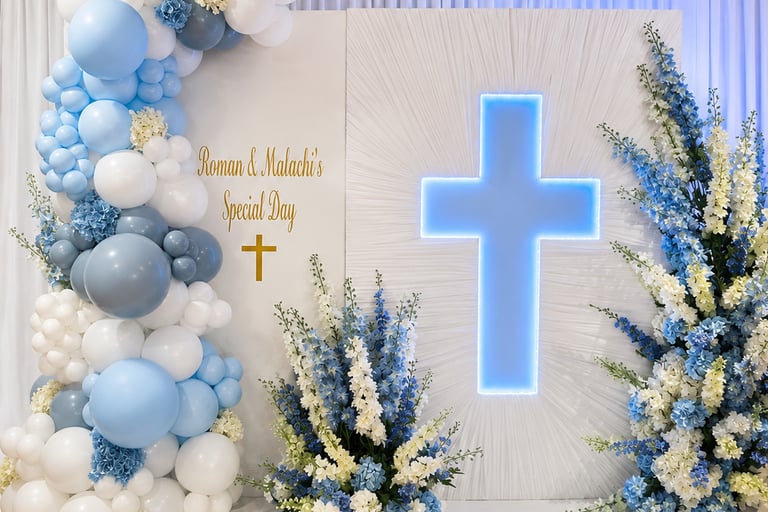 Elegant blue and white baptism backdrop featuring a glowing cross, balloon arch, and floral arrangements.