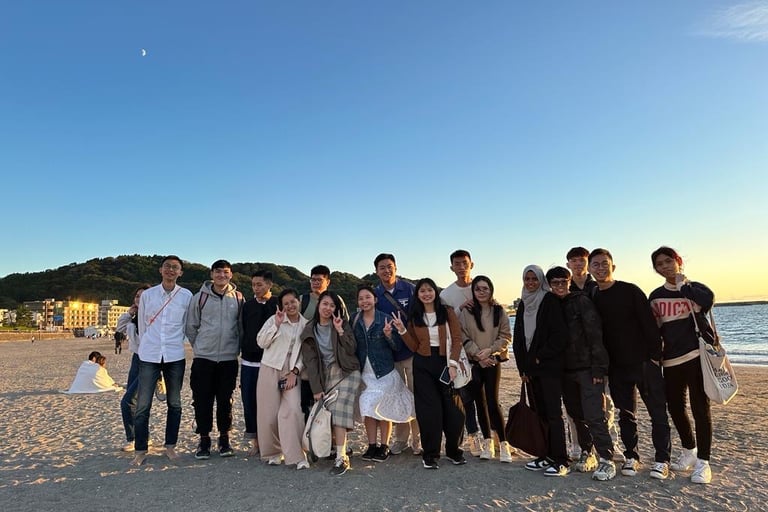 A team of coffee people in Japan beach side company trip