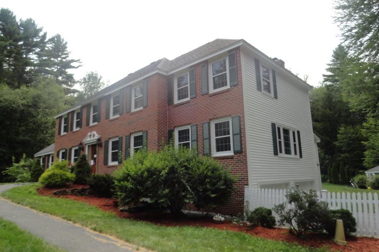 Vinyl windows with white vinyl siding