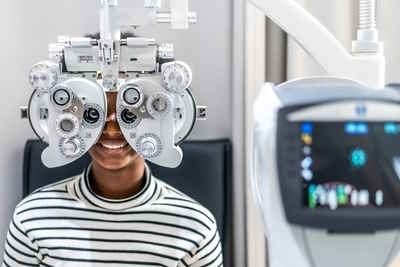 teenage girl eye testing