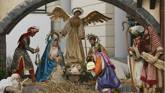 a nativity scene with a nativity of jesus and tradional figures