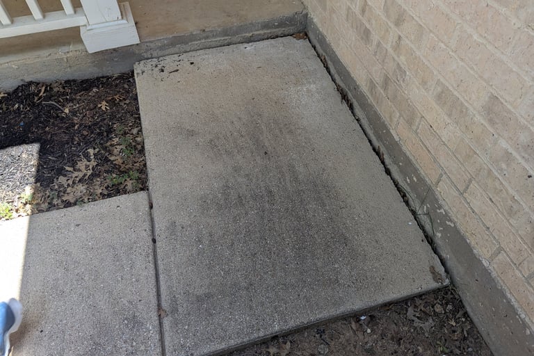 Before picture of a landing/side walk in Krum Texas