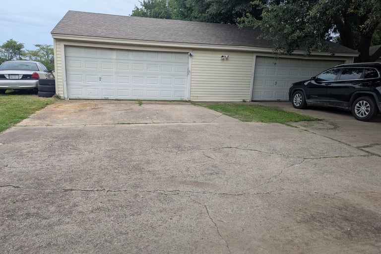 Before picture of a residential driveway that needs cleaned. 