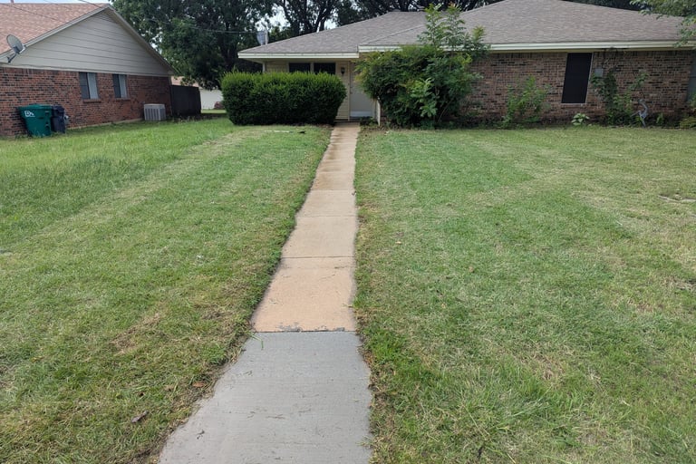 After picture of a residential side walk in Denton Tx