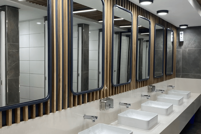 row of sinks and mirrors