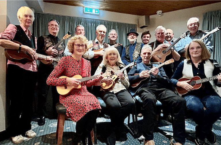 Banjo ukulele band supporting the SCMGS charity music Beatles pop entertainment