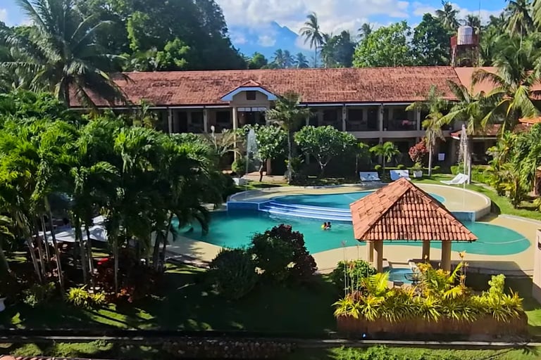 The Pool and gardens at The Sierra Resort ideal to unwind after a day diving