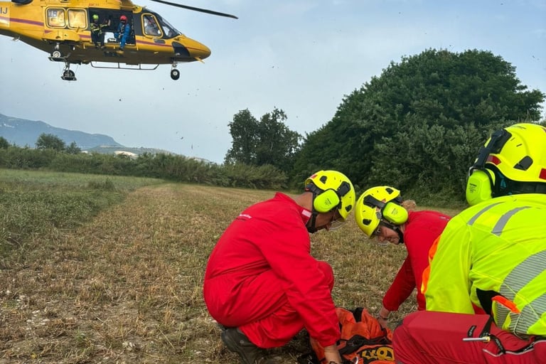 Medical personnel during practical training in front of an Agusta AW139 helicopter - training